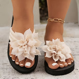 Livia | Eleganta sandaler med blomdetalj