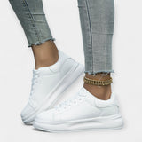 Vita sneakers i skinn
