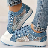 Eleganta sneakers med spetsdetaljer