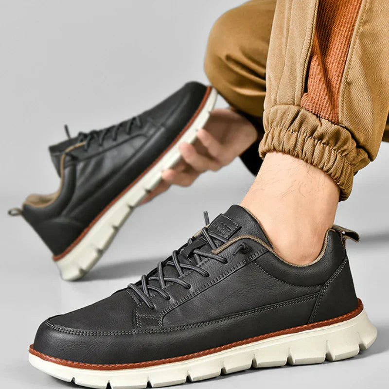 Stödjande sneakers i läder