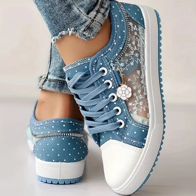Eleganta sneakers med spetsdetaljer