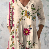 Catherine | Elegant beige blus med V-ringning