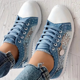 Eleganta sneakers med spetsdetaljer
