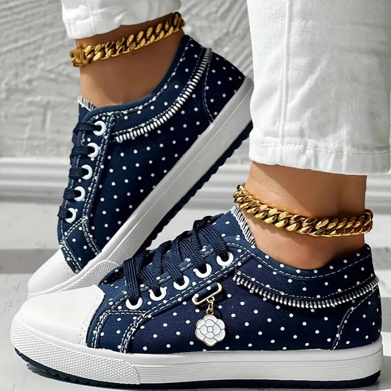 Eleganta sneakers med spetsdetaljer
