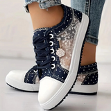 Eleganta sneakers med spetsdetaljer