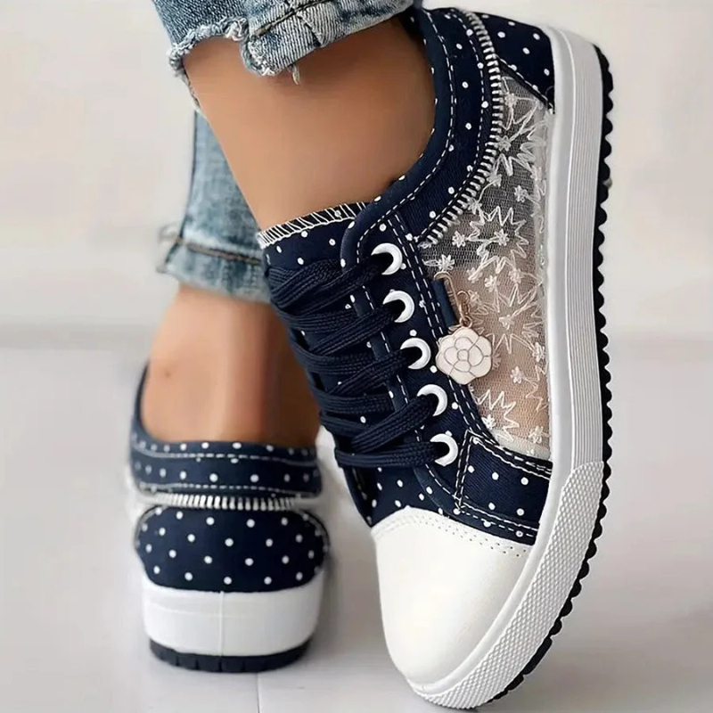 Eleganta sneakers med spetsdetaljer