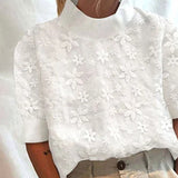 Carla | Blus med broderad ståkrage