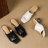 Odile | Mules med skulptural klack