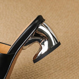 Odile | Mules med skulptural klack