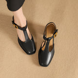 Corinne | Perforerade pumps med T-rem
