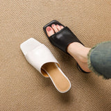 Odile | Mules med skulptural klack