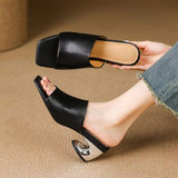 Odile | Mules med skulptural klack