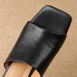 Odile | Mules med skulptural klack