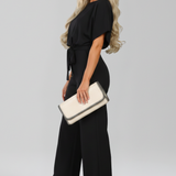 Produktbild – Danielle – Klassisk Jumpsuit Med Knytskärp Och Vida Ben För Dam