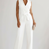Produktbild – Kimberly – Ärmlös V-ringad Jumpsuit Med Knytmidja För Dam