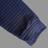 Texturerad långärmad pikétröja