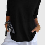 Produktbild – Cassandra – Elegant V-ringad topp