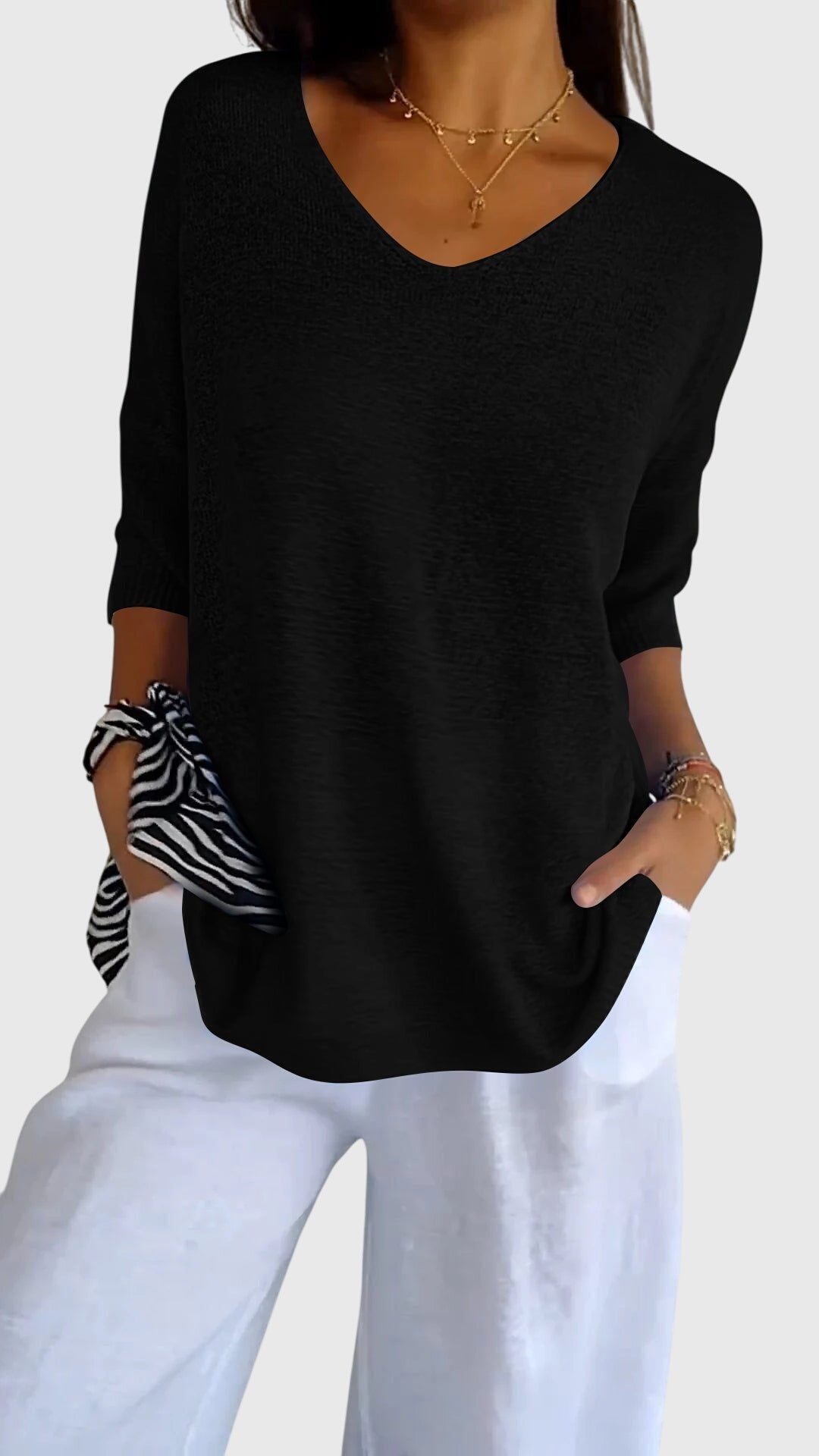 Produktbild – Cassandra – Elegant V-ringad topp