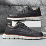 Stödjande sneakers i läder