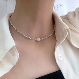 Elegant halsband med pärlor