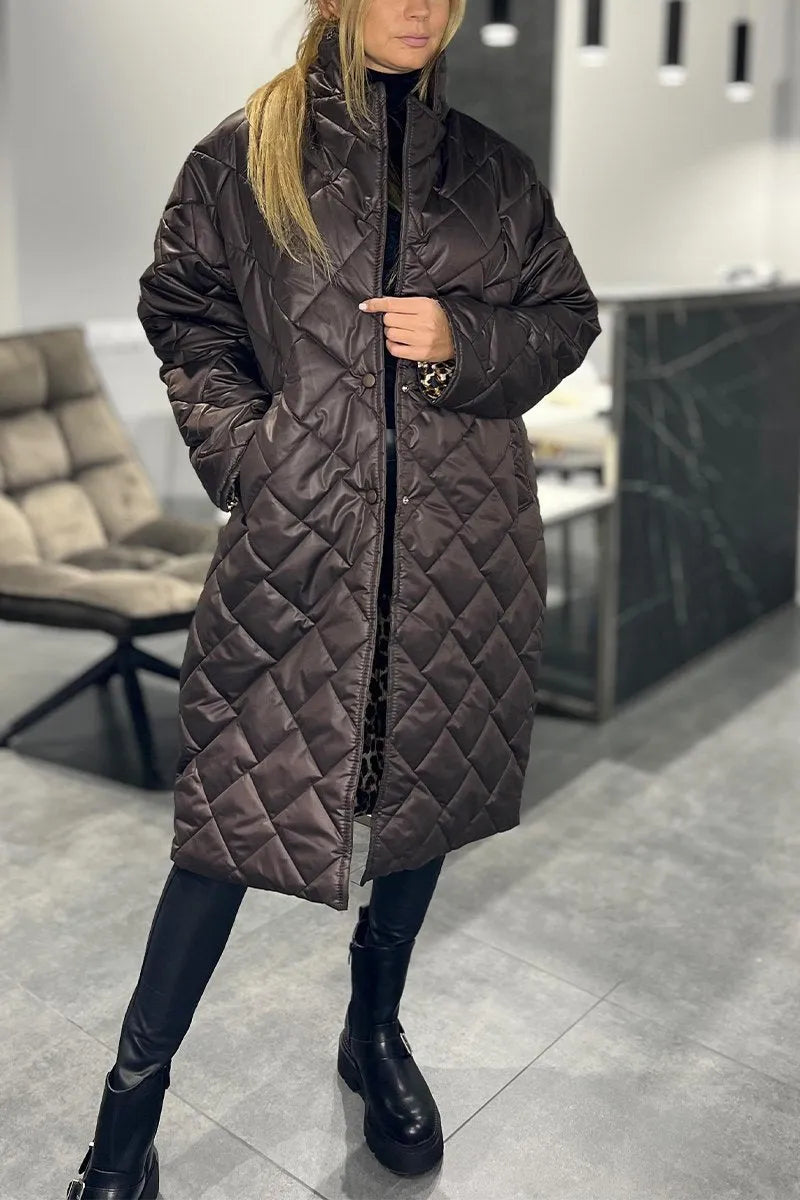 Produktbild – Kynzi – Elegant Vadderad Kappa